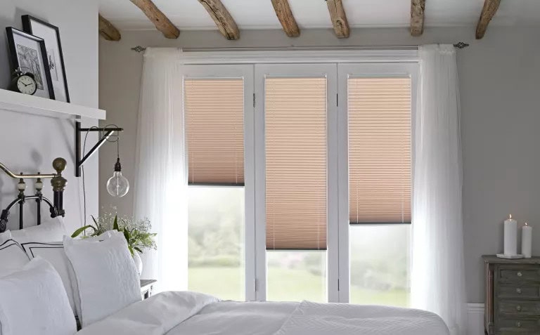 Cellular honeycomb blinds fitted to a Perth window