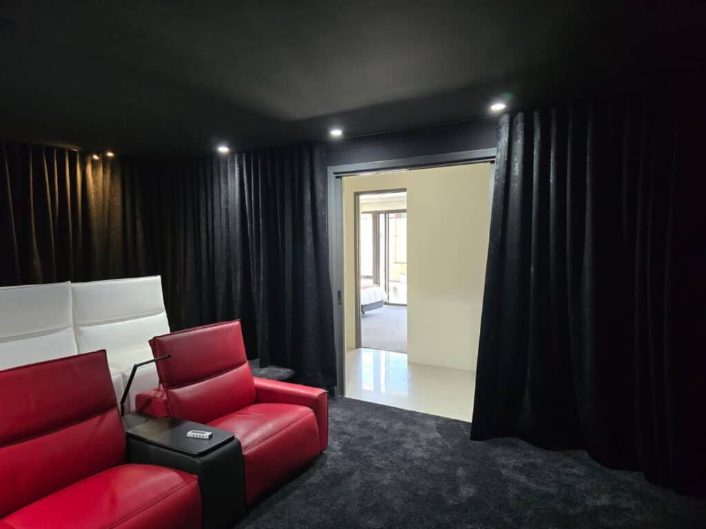 Home theatre curtains covering a doorway in a Perth media room