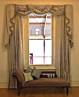 Traditional swag and tails curtains at Hoover House Gwalia