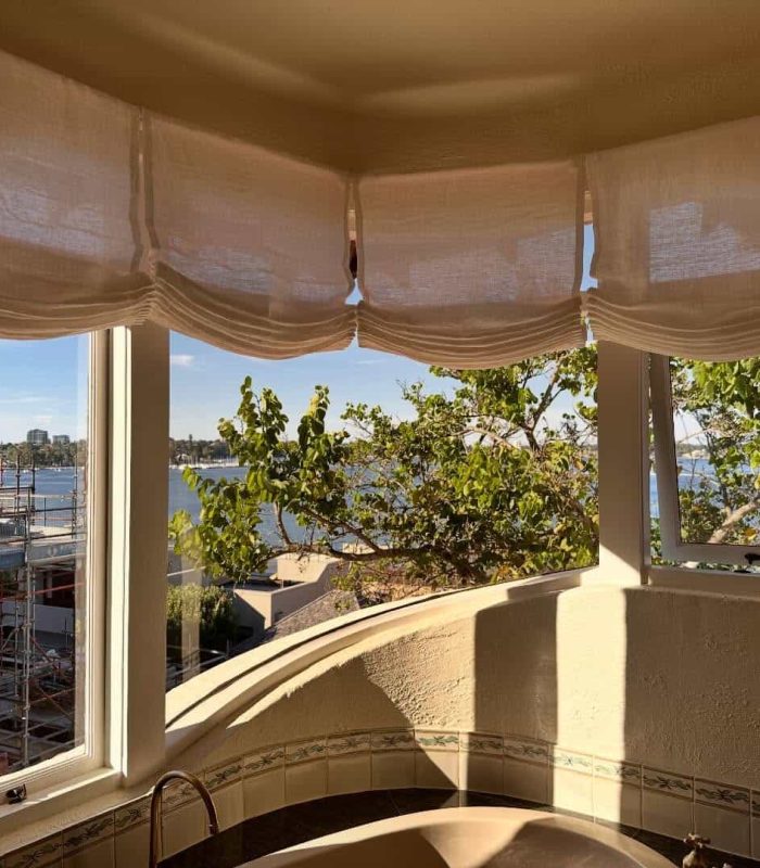 Relaxed Roman blinds raised in a Perth household